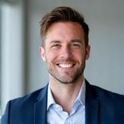 Professional headshot of Marcus Thorne, a Contrast Dwellings real estate agent, with a friendly, approachable expression.